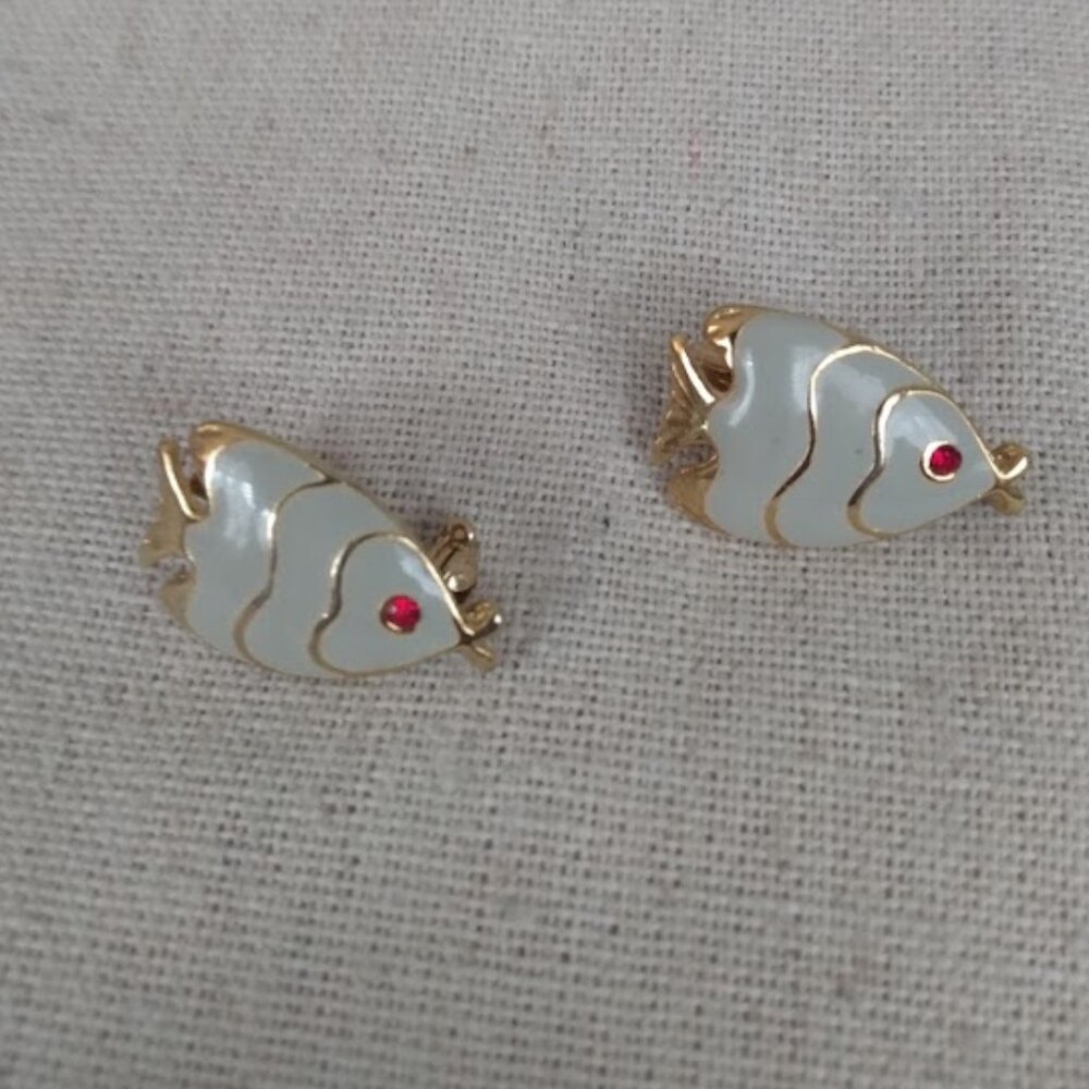 Cute gold tone & gray set of two fish pins with red rhinestone eyes.
